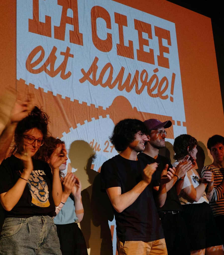 Members of the collective celebrating after La Clef was saved, June 2024